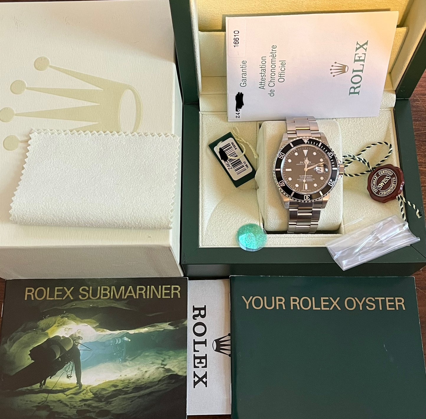 Rolex Submariner Date 40mm Ref.16610 Box & Papers