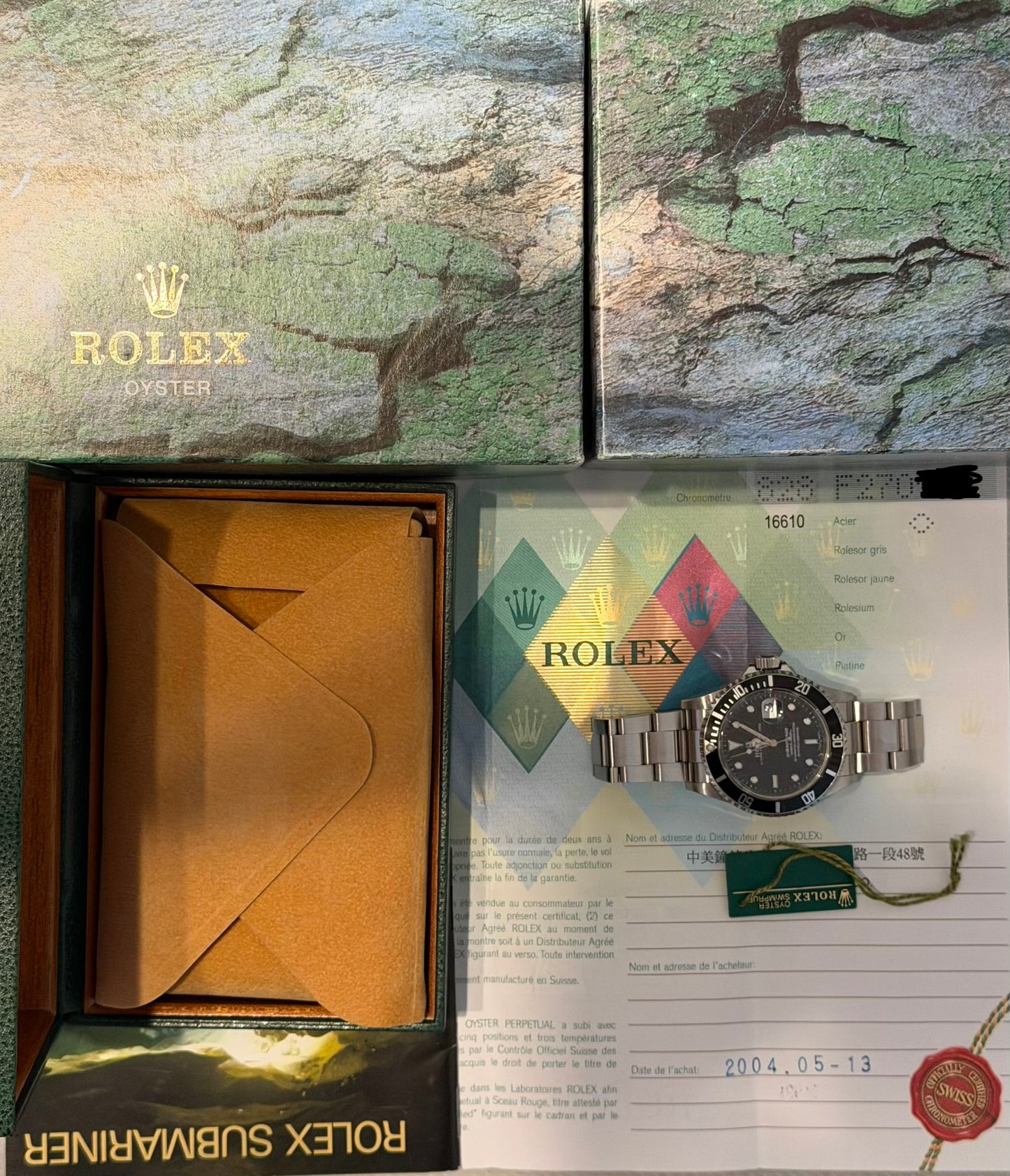 Rolex Submariner Date 40mm Ref.16610 Box & Papers