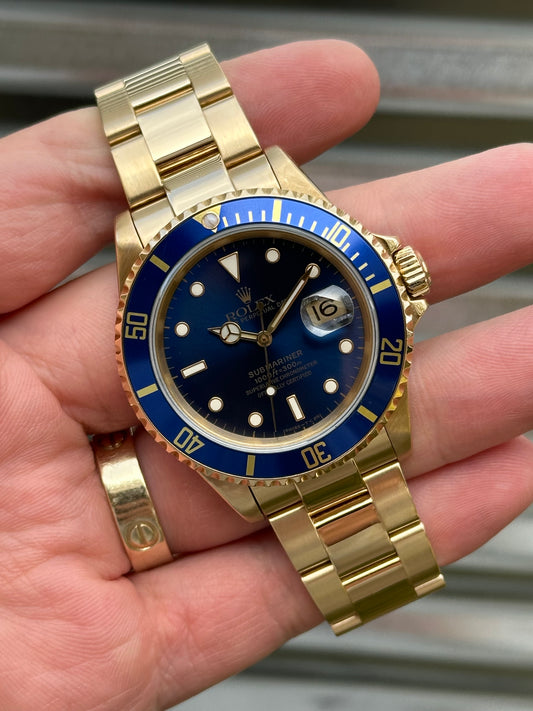 Rolex Submariner Date Ref.16618LB 18k Gold Box & Papers