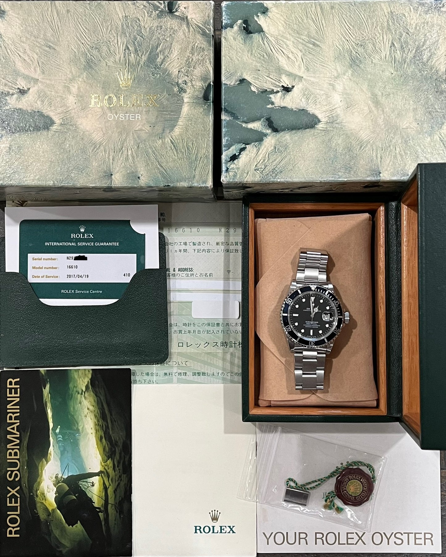 Rolex Submariner Date 40mm Ref.16610 Box & Papers & Rolex Service Card